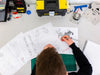 Custom industrial asset tags professionally applied to various industrial equipment and machinery